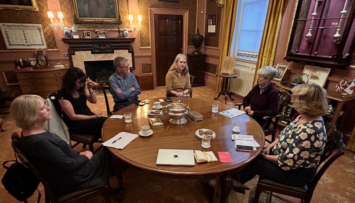 Image Bath IFG members sit round a table in teh Parlour with the Mayor of Bath Cllr Ruth Malloy