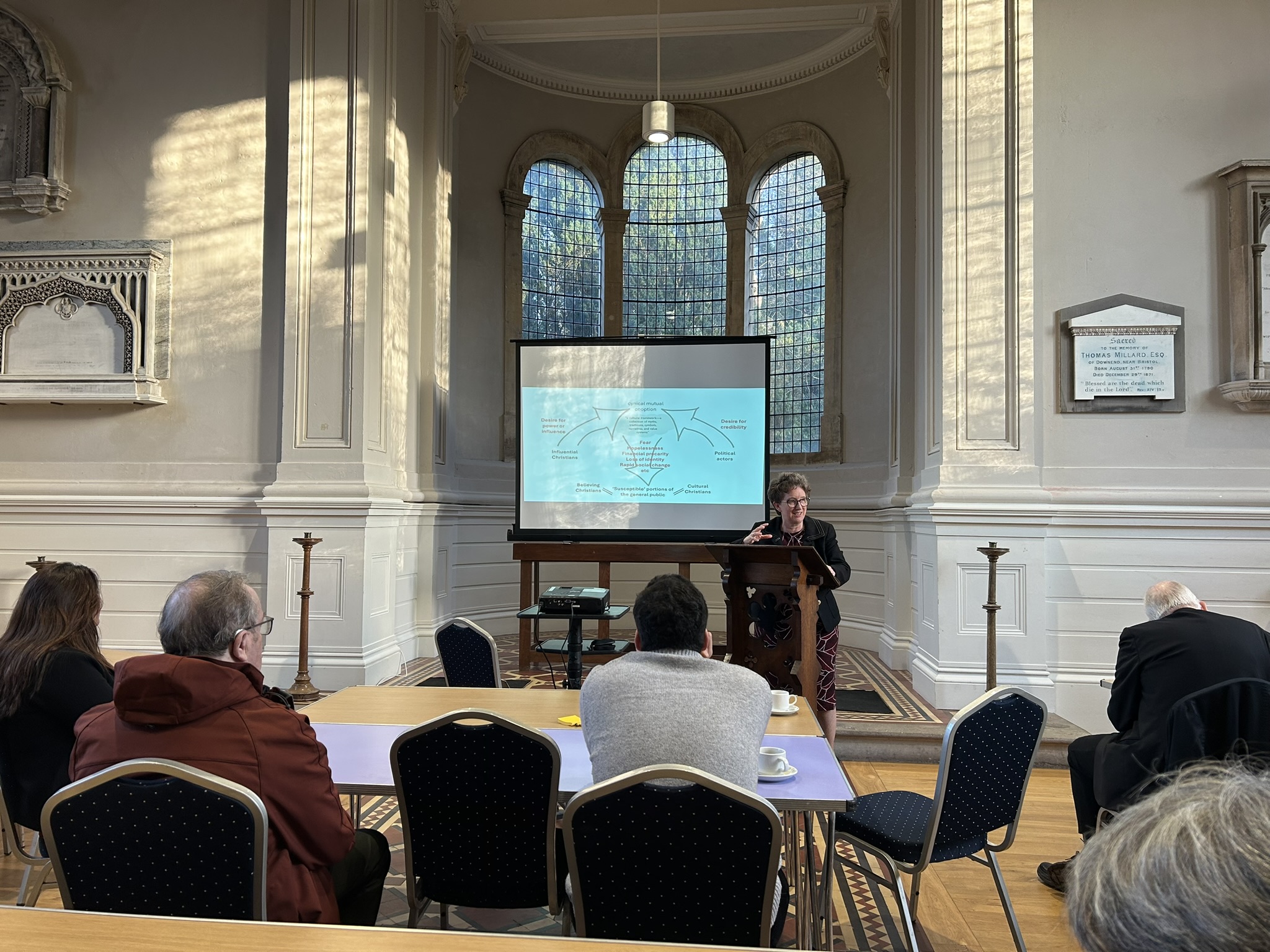 Revd Heather Paynter presents her work / alt text