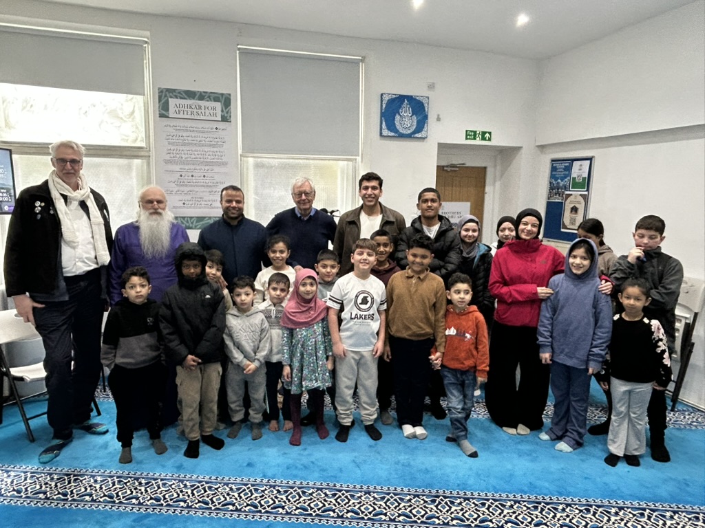 Image description / Bishop Malkhaz with the Bath Mosque community